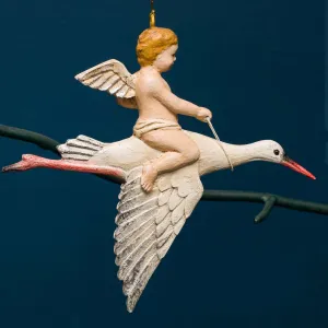 CHERUB ON STORK ORNAMENT